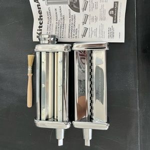 never used Kitchenaid pasta roller and fettuccine pasta cutter